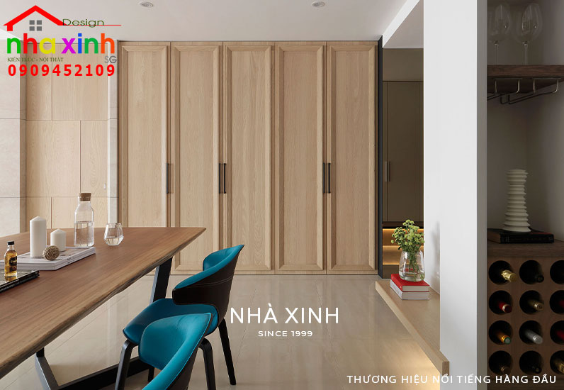 Không gian bàn ăn được tạo điểm nhấn với tone màu xanh